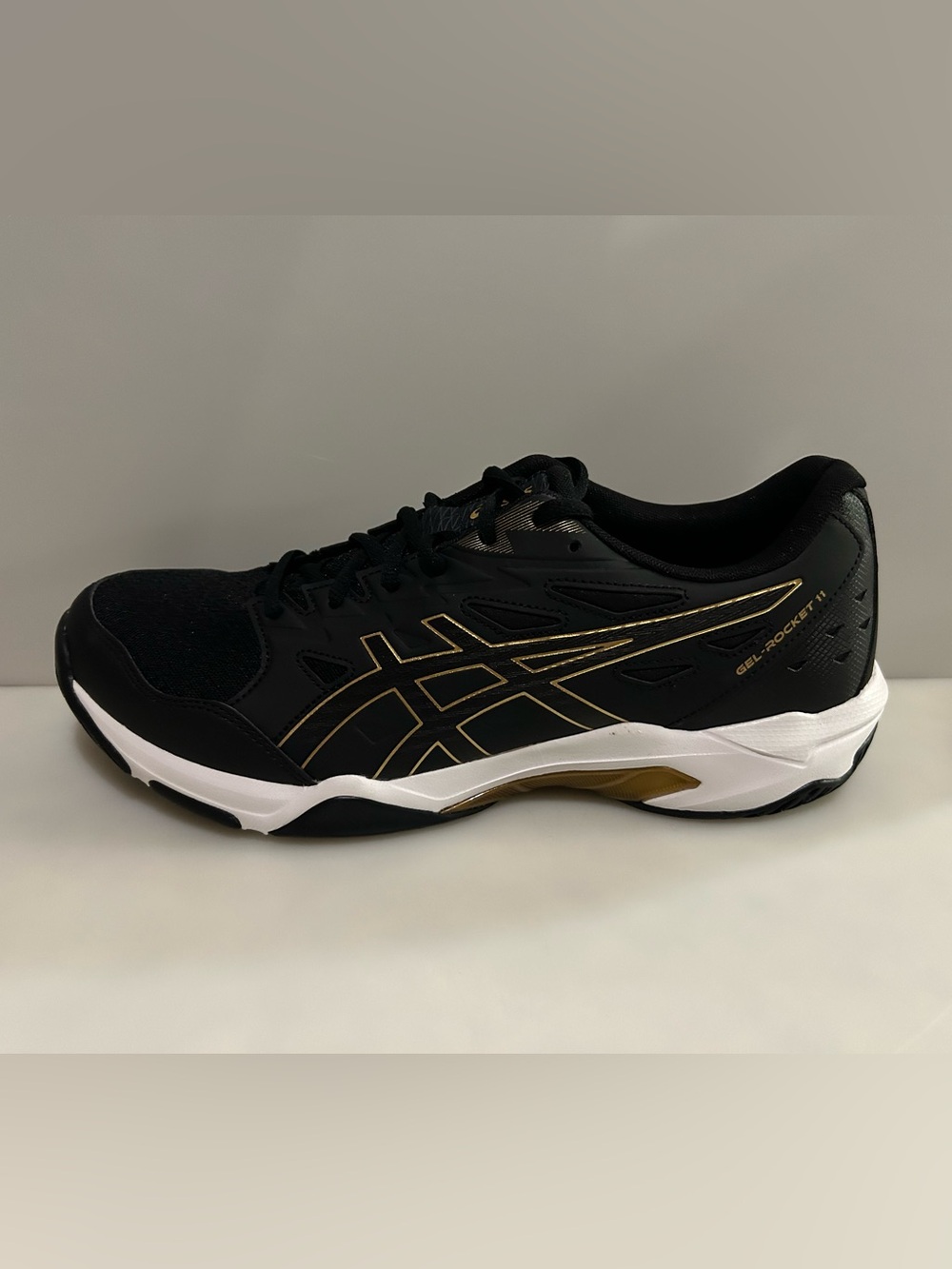 New Asics Men’s Gel-Rocket 11 Black & Gold Court Shoes - Size 11.5 / EU46 NIB